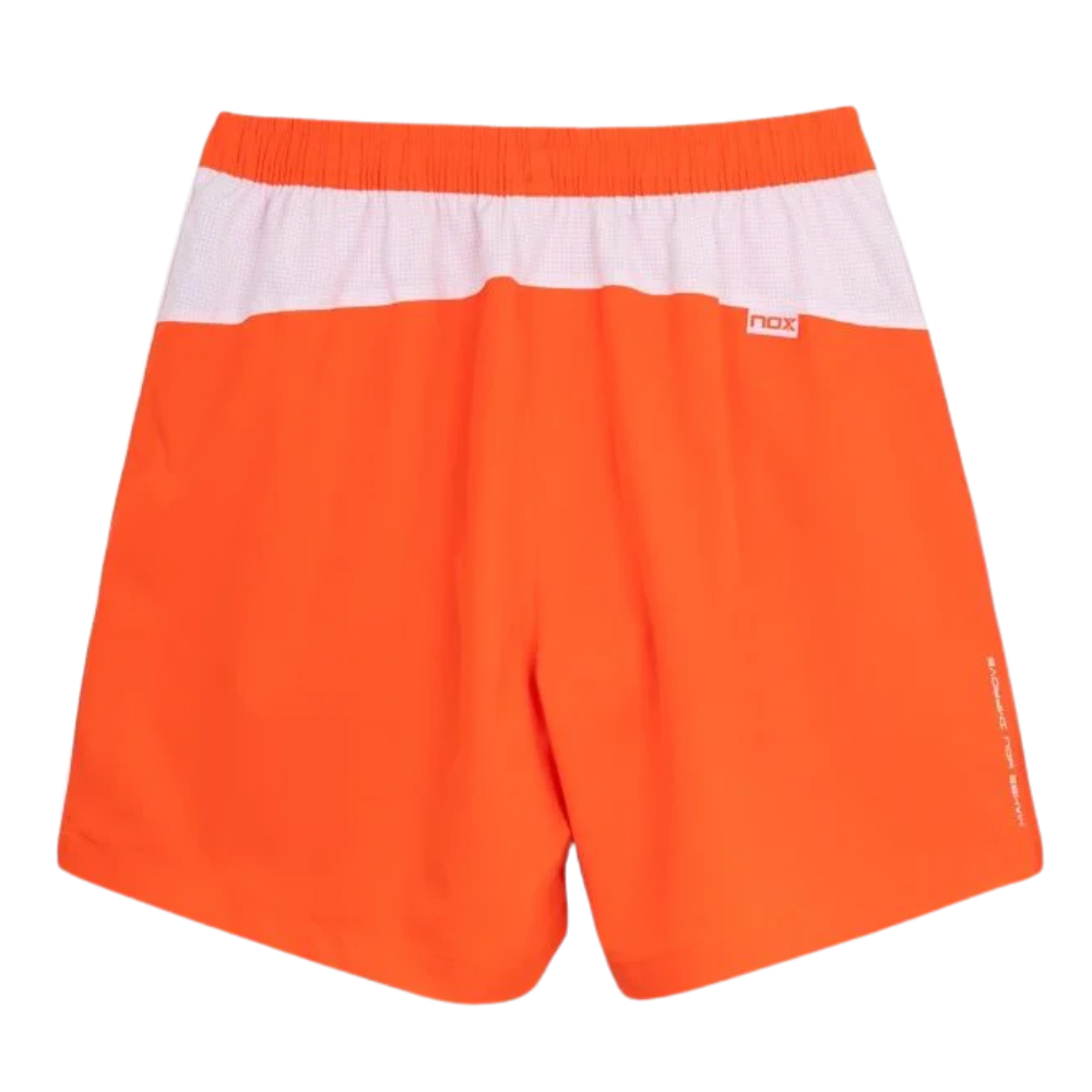 SHORT HOMBRE TEAM NARANJA 2026