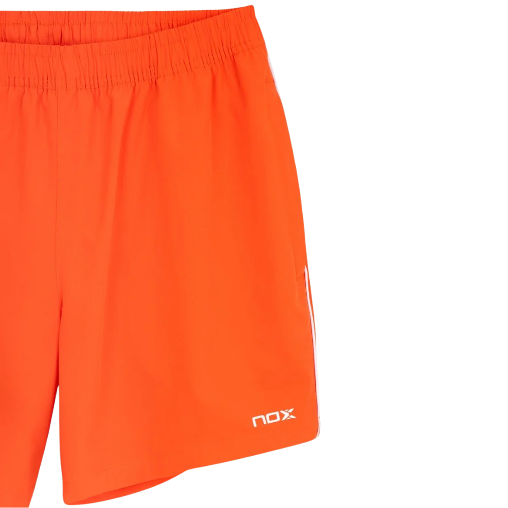 SHORT HOMBRE TEAM NARANJA 2026